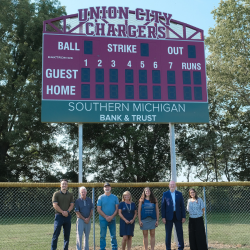 Scoreboard group photo